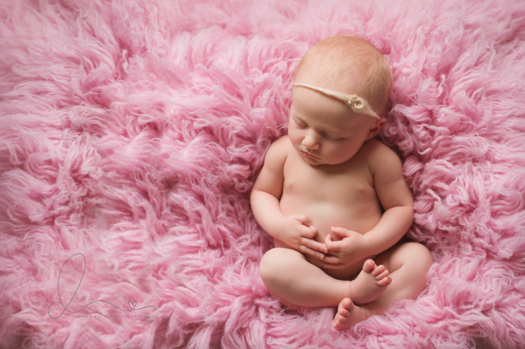 Seattle newborn photographer | newborn baby girl on flokati