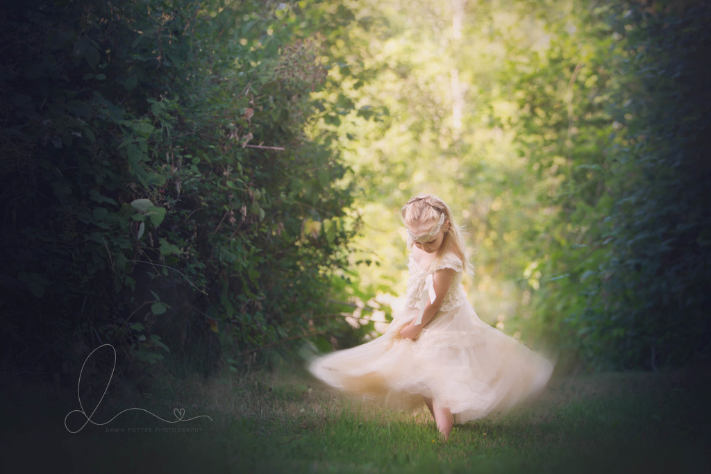 child dancing in grass | Maple Valley children's photographer