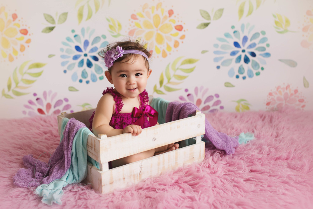 Baby girl in crate | Seattle newborn-baby photographer