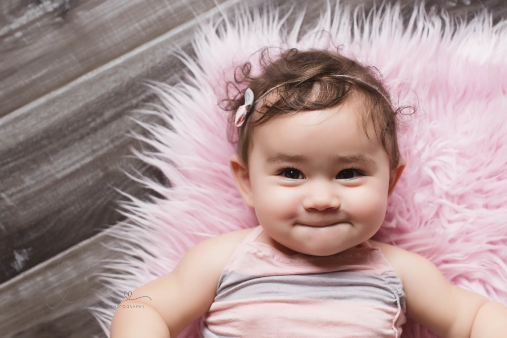 baby girl smiling | Seattle newborn-baby photographer