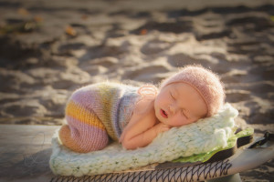 newborn beach session | baby on a surfboard | Seattle outdoor newborn - baby photographer