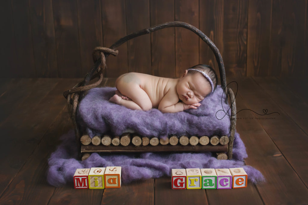 Bellevue newborn session | baby girl on prop | Eastside newborn session