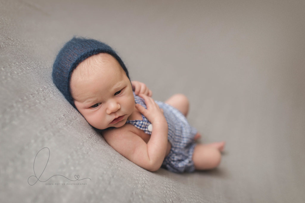 Issaquah newborn session | issaquah baby boy lying on back