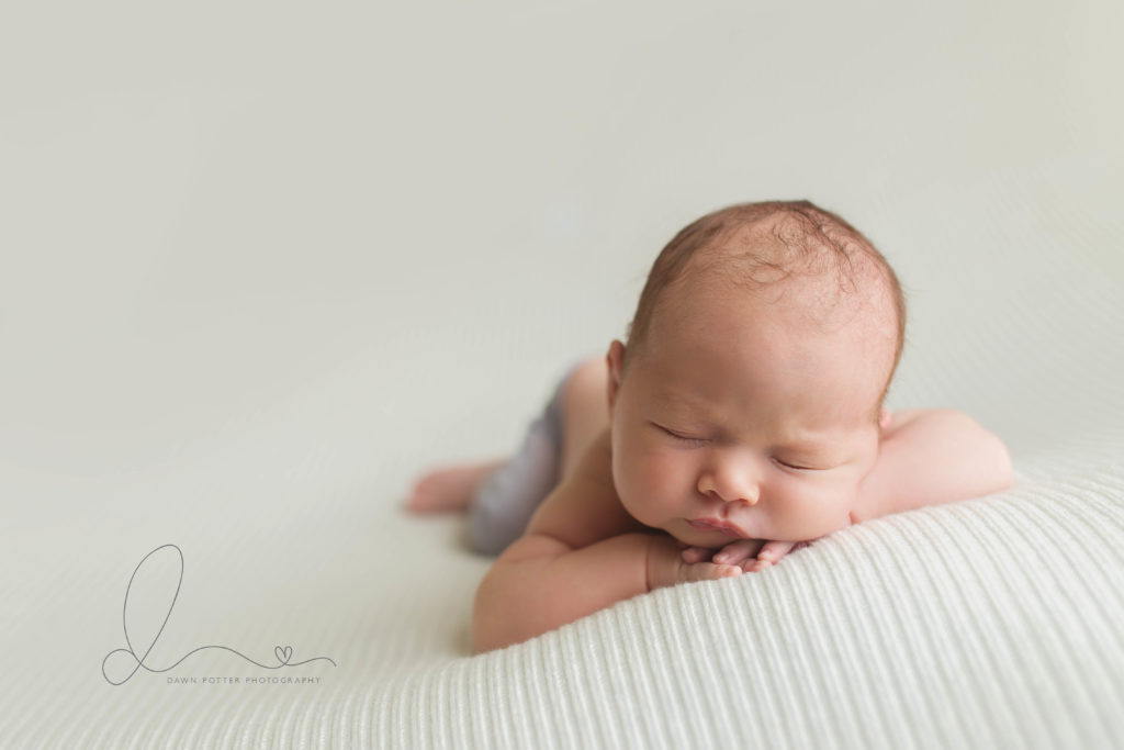 three week newborn | Seattle newborn baby girl head on chin pose